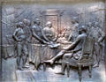 Bronze relief on base of Benjamin Franklin statue of Franklin at the signing of the Declaration of Independence. Boston, MA.
