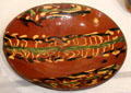 Earthenware redware platter from Pennsylvania at Museum of Fine Arts. Boston, MA.