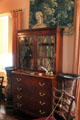 Secretary flanked by Japanese jars owned by Dr. Nichols in parlor at Nichols House Museum. Boston, MA.
