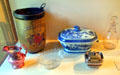 Thoreau family objects including Staffordshire lusterware pitcher , fire bucket , glass sweetmeat dish , Chinese export porcelain covered tureen , Staffordshire lusterware covered sugar bowl , & English glass decanter at Concord Museum. Concord, MA.