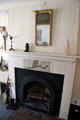 Owl painting by May Alcott on mantle of Louisa May Alcott's bedroom fireplace at Orchard House. Concord, MA.