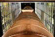 Original smoke stacks rising through converted interior of Power Plant. Baltimore, MD.