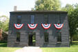 Logan County Courthouse where Abraham Lincoln tried cases as circuit rider , moved from Postville , IL to Greenfield Village. Dearborn, MI.