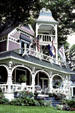 Victoria house with open tower at Woodland & Encampment Aves. Petosky, MI
