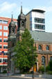 The Church of St. Louis, King of France in front of Elmer L. Andersen Human Services Building. St. Paul, MN.
