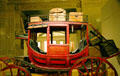 Concord-style Des Moines Palmyra mail coach in History Hall at Missouri State Capitol. Jefferson City, MO.