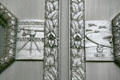Cast aluminum door detail of Browning machine gun 1916-18 & aircraft 1940 at War Memorial Building. Jackson, MS.