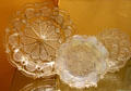 New England pressed glass plates used lacy pattern to hide imperfections at Museum of American Glass. Milville, NJ.
