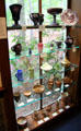 Collection of American marbled glass objects at Museum of American Glass. Milville, NJ.