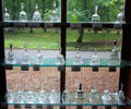 Collection of American cut glass dinner table bells used to summon staff at Museum of American Glass. Milville, NJ.