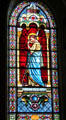 St Thomas stained glass window in St Francis Cathedral. Santa Fe, NM.
