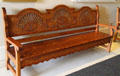 Taos style bench by Antonio Archuleta in NM State Capitol Art Collection. Santa Fe, NM.