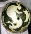 Mimbres classic black-on-white pottery bowl with rabbits at Maxwell Museum of Anthropology. Albuquerque, NM.