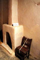 Chimney & chair at Hacienda de los Martinez. Taos, NM.