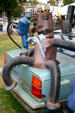 Car Gremlins sculpture by Doug McCallum in Art on Wheels Fair. Buffalo, NY.
