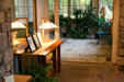 Conservatory layout with Wright-style table & lamp in Graycliff. Buffalo, NY.
