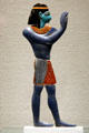 Egyptian-Ptolemaic glass inlay of figure at Corning Museum of Glass. Corning, NY.