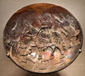 Islamic glass dish with rider & animals at Corning Museum of Glass. Corning, NY.