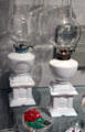 American white glass whale oil lamps by New England Glass Co. of Cambridge, MA at Corning Museum of Glass. Corning, NY.