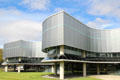 Undulating glass walls of Corning Museum of Glass. Corning, NY.