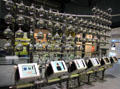 Wall of glass flasks at Corning Museum of Glass. Corning, NY.