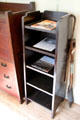 Roycroft shelf unit with shovel given to Hubbard by Luther Burbank