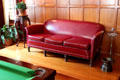 Leather sofa on raised platform for better viewing of billiard games at Eastman House. Rochester, NY.