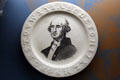 Porcelain plates with Washington's image & alphabet around rim at Federal Hall. New York, NY.
