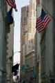 Wall Street viewed east from Trinity Church including Stock Exchange at right. New York, NY.