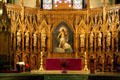 Alter screen with carved wooden disciples in St. Patrick's Old Cathedral. New York, NY.