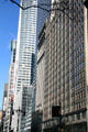 Streetscape of West 42nd St. from Fifth Ave. with Bank of America, HBO, Grace, State University College of Optometry by Warren & Wetmore, & Salmon Towers. New York, NY.