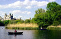 Boating on a lake in Central Park. New York, NY.
