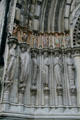 Carved saints & Gothic creatures beside entrance of St. John the Divine. New York, NY.