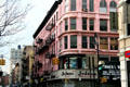 Pink rounded corner heritage building. New York, NY.