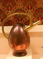 Copper & brass watering can by Christopher Dresser for Benham & Froud of London at Metropolitan Museum of Art. New York, NY.
