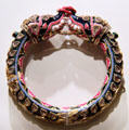 Bangle with elephant finials from Benares, India at Brooklyn Museum. Brooklyn, NY.