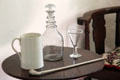 Glass decanter, cup & pipe at Conference House. Staten Island, NY.