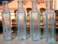 Medicine bottles etched with the name of Dr. E. Miles of Sag Harbor at Annie Cooper Boyd House museum. Sag Harbor, NY.