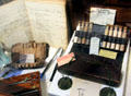 Medications, medical instruments & notebook which belonged to Dr. Edgar Miles at Annie Cooper Boyd House museum. Sag Harbor, NY.