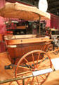 Governess Cart with door at rear to keep children away from horses for safety by Brewster & Co. of New York City at carriage collection of Long Island Museum. Stony Brook, NY.