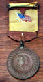 Commemorative ribbon & metal of 1897 inauguration with profiles of McKinley & Hobart at William McKinley Presidential Museum & Library. Canton, OH.