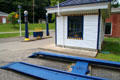 Joyce-Cridland Auto Lift beside Sun Oil Station at Carillon Historical Park. Dayton, OH.