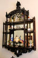 Bric-a-brac wall shelf with figurines at Chepstow. Newport, RI.