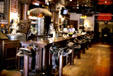 Stockyards Hotel bar with saddles for stools. Fort Worth, TX.
