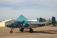 B-25 Mitchell at Lone Star Flight Museum seen against pyramids of Moody Gardens. Galveston, TX.