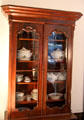 China cabinet at Nichols-Rice-Cherry House at Sam Houston Park. Houston, TX.