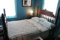 Bedstead in Yates House at Sam Houston Park. Houston, TX.