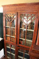Bookcase in Staiti House at Sam Houston Park. Houston, TX.