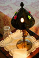 Bedside lamp with crystals in shade in Staiti House at Sam Houston Park. Houston, TX.