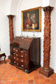 Dropfront desk & carved pillars from Mexican palace at Rienzi house museum. Houston, TX.